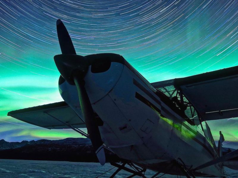 Airplane and northern lights